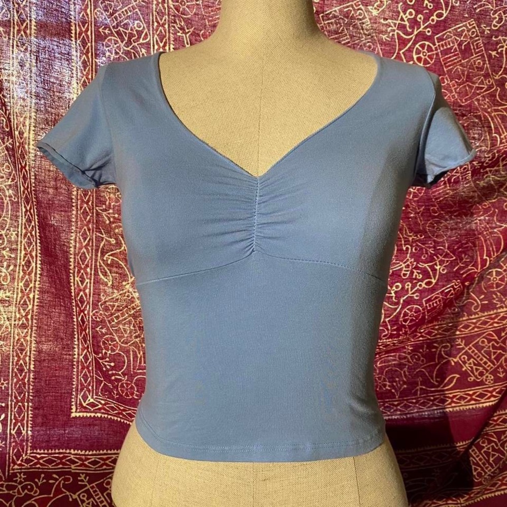 Brandy Melville baby blue cinched v neckline crop top